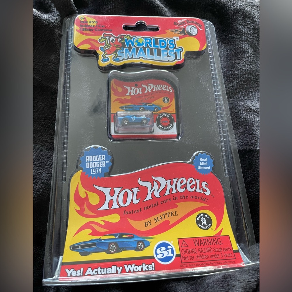 NWT - World’s Smallest Toy Hot Wheels Blue Car. Fully sealed, never opened.